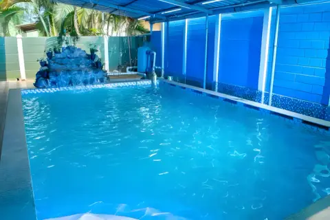 Indoor swimming pool at Dolphin House - resort with swimming pool Alibaug